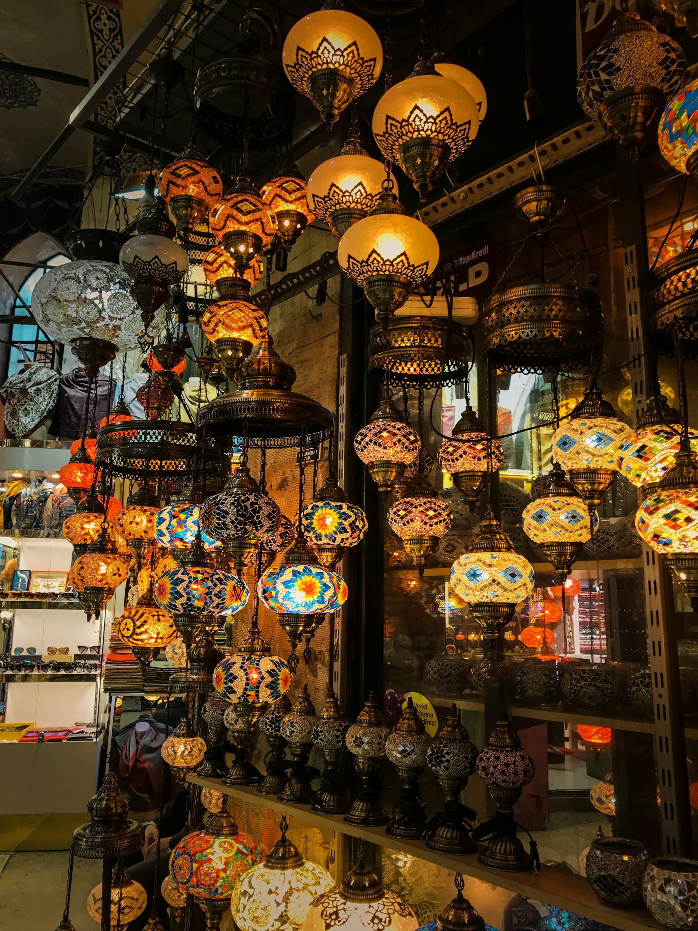 Ornate mosaic lamps glowing at a traditional bazaar